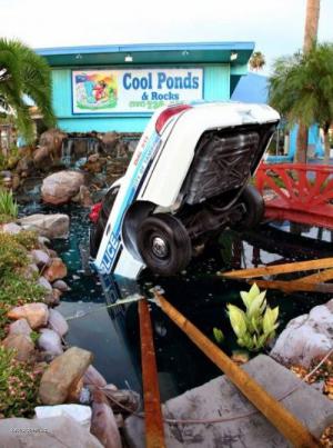 X Police Car Crashes Into Water